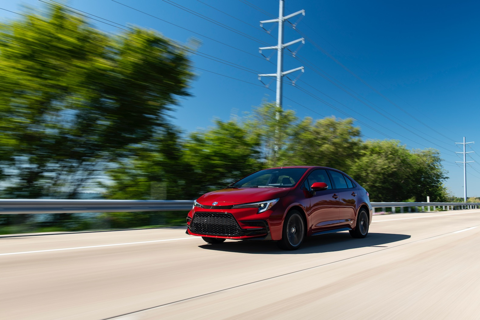2023_Corolla_Hybrid_SE_RubyFlarePearl_003