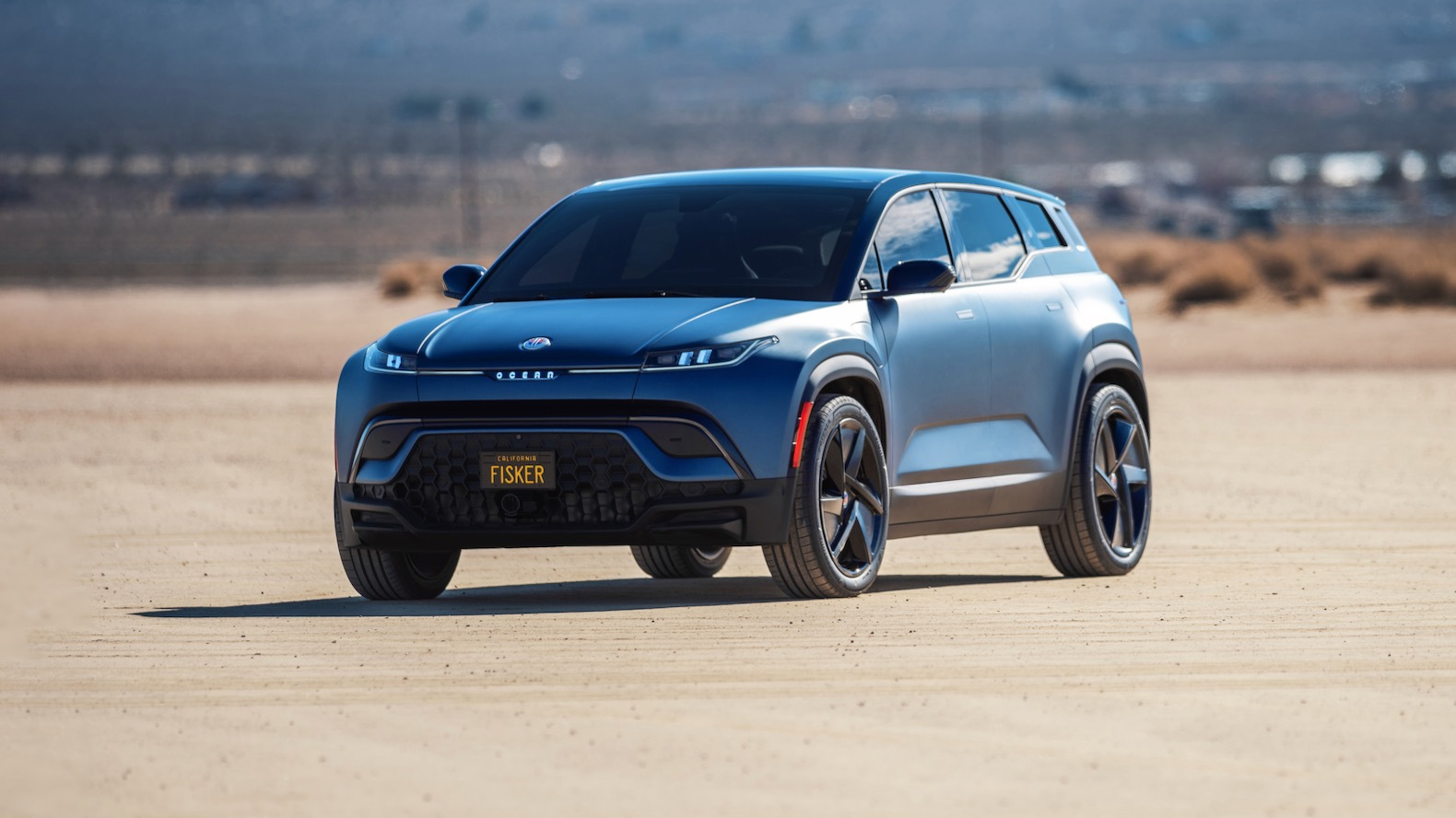 Fisker Ocean Big Sur Blue Matte in Rabbit Lake; Front 3-4 shot